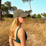 Leaf cap, 100% cotton, embroidered, green cap. it's okay to be exactly who you are. From Portugal with love. (Image: blond girl wearing leaf cap in a field) Boné de pala azul de algodão bordado em Portugal.