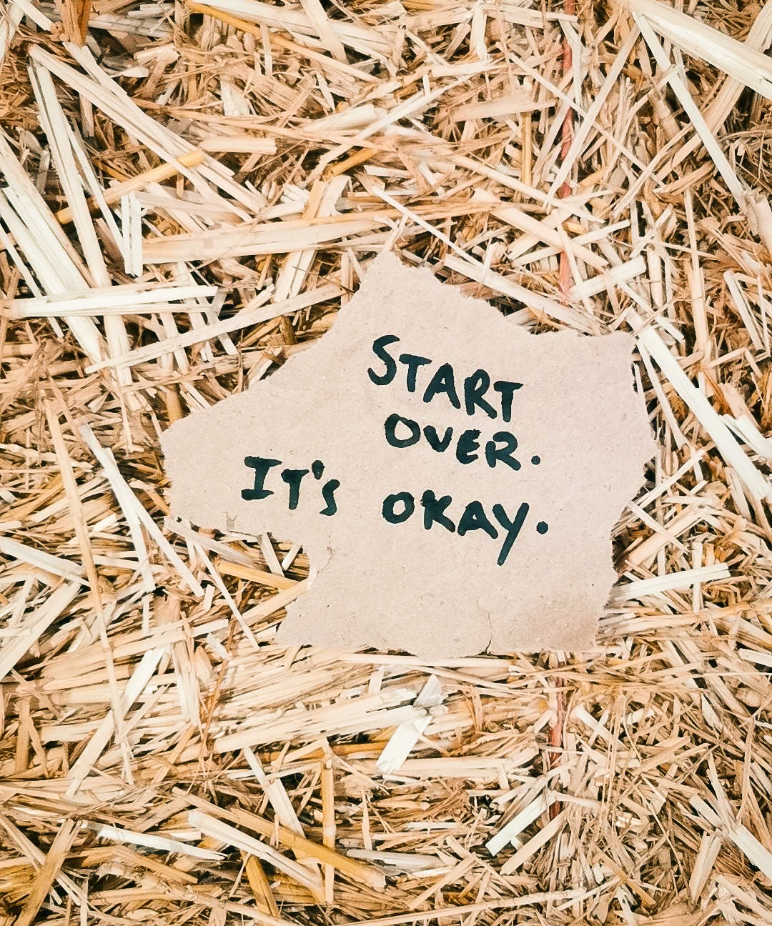 paper written: start over it's okay. Join us. Made in Portugal with love. We share motivational quotes and talk about things that matter. See you soon. 