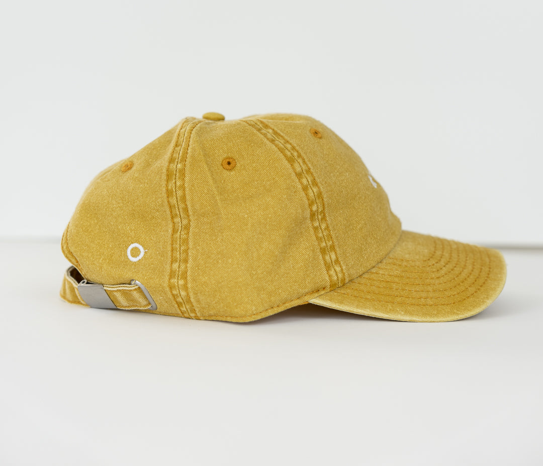 Mustard cap, yellow cap made with 100% cotton, embroidered. it's okay to be exactly who you are. From Portugal with love. Boné de pala amarelo de algodão bordado em Portugal.
