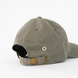 it's okay organic cap khaki | made with organic cotton, embroidered. This is a studio photography of the back of the cap.