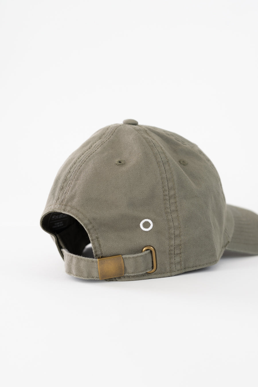it's okay organic cap khaki | made with organic cotton, embroidered. This is a studio photography of the back of the cap.