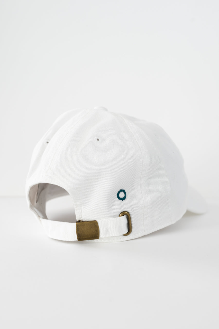 it's okay organic cap khaki | made with organic cotton, embroidered. This is a studio photography of the back of the cap.