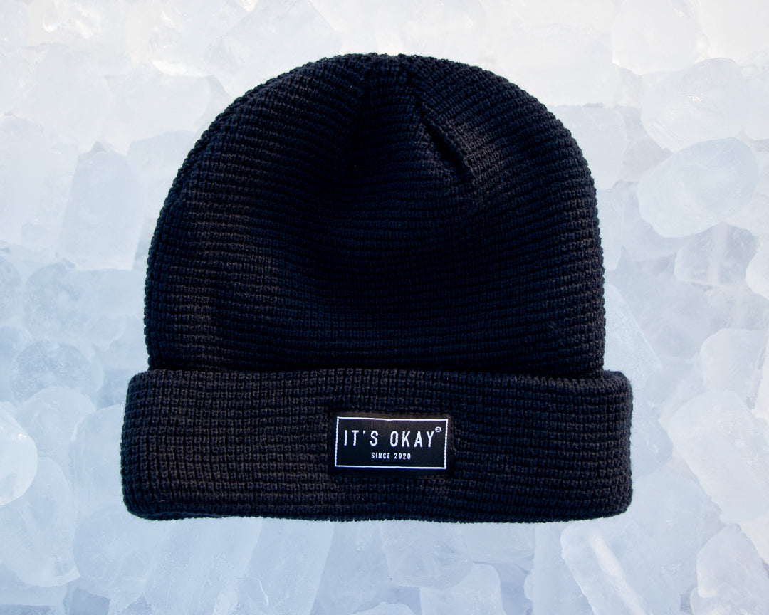 Blue Beanie from It's okay | design in Portugal with love | feel cozy and warm with this knitted beanie | gorro feito em Portugal, wear it with pride. Image: blue waffle beanie on ice.