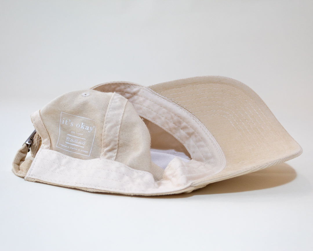Pearl cap | cotton needlecord corduroy in beige. Embroidered in Portugal. One size fits most | Wear it with pride. It's okay to be exactly who you are. Pt: Boné algodão de pala em bombazine de cor bege, tamanha ajustável. 